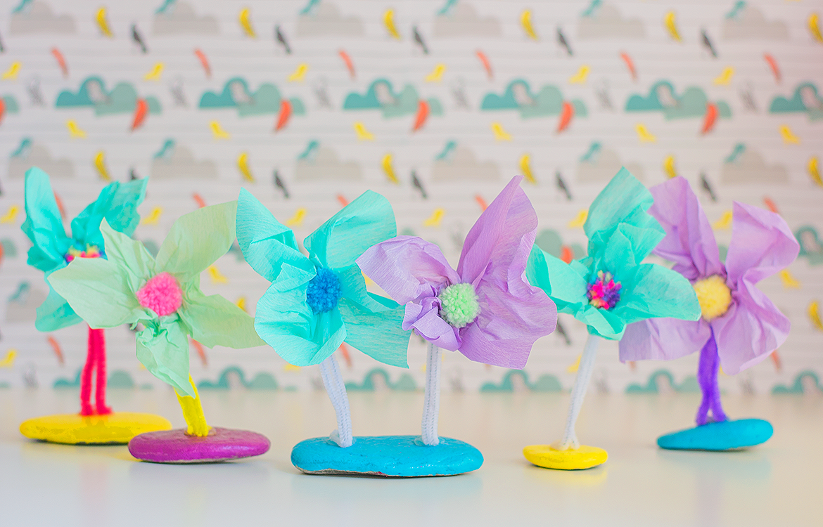 pretend flowers made from tissue paper and pom poms